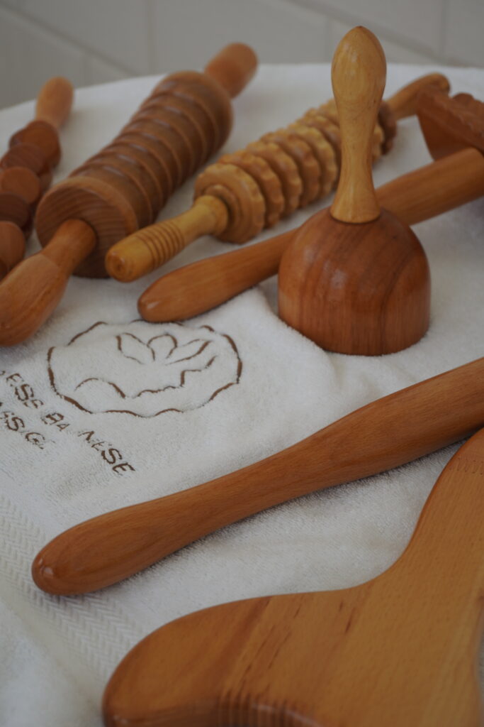 Madero wood therapy tools on an Empress towel