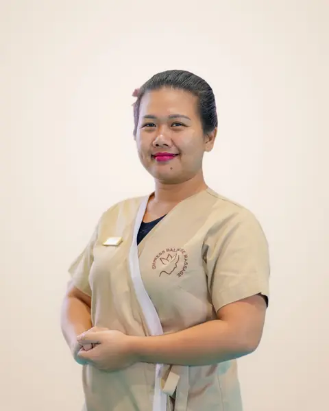 Dewi, Empress Balinese Massage therapist in beige Empress uniform