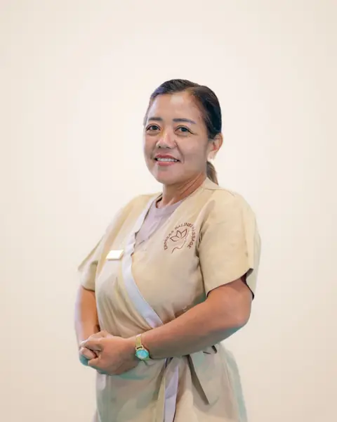 Putu, Empress Balinese Massage therapist in beige Empress uniform