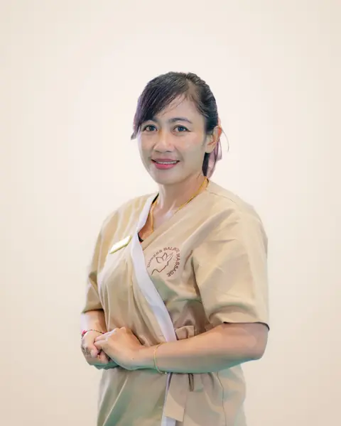 Tini, Empress Balinese Massage therapist in beige Empress uniform