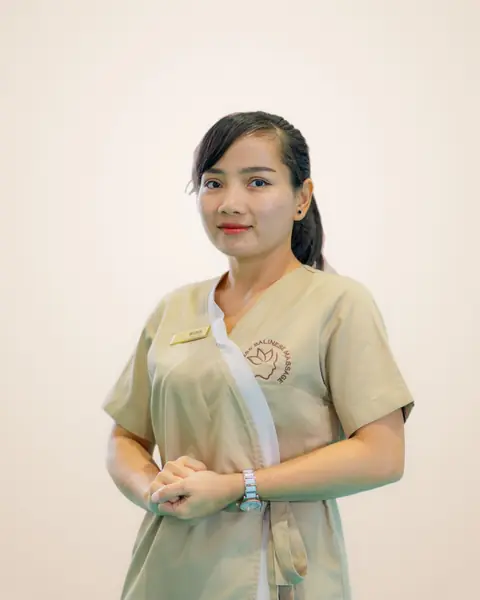 Wina, Empress Balinese Massage therapist in beige Empress uniform