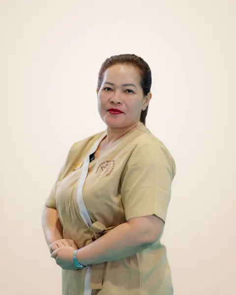 Yuli, Empress Balinese Massage therapist in beige Empress uniform