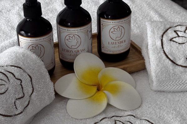 three types of essential oils on empress towels